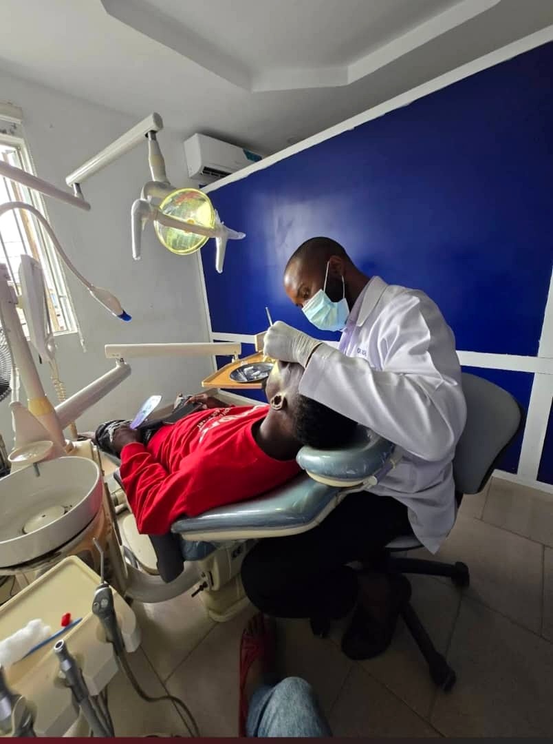 Dentist providing dental care to a patient